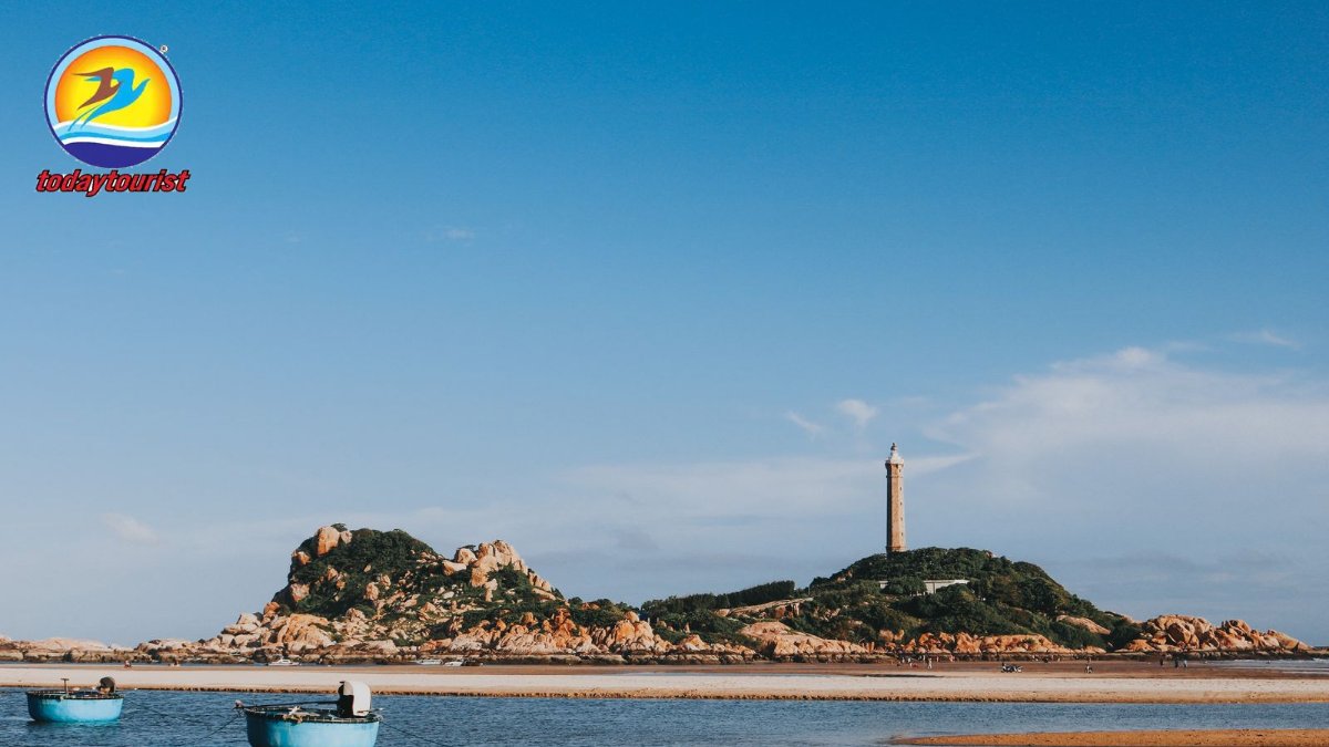 Scenic view of Ke Ga Cape lighthouse and boats in Bình Thuận, Vietnam 